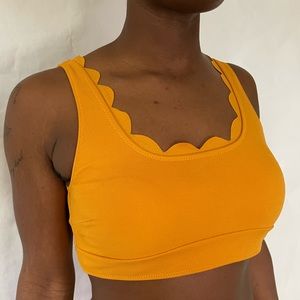 Scalloped edge sports bra